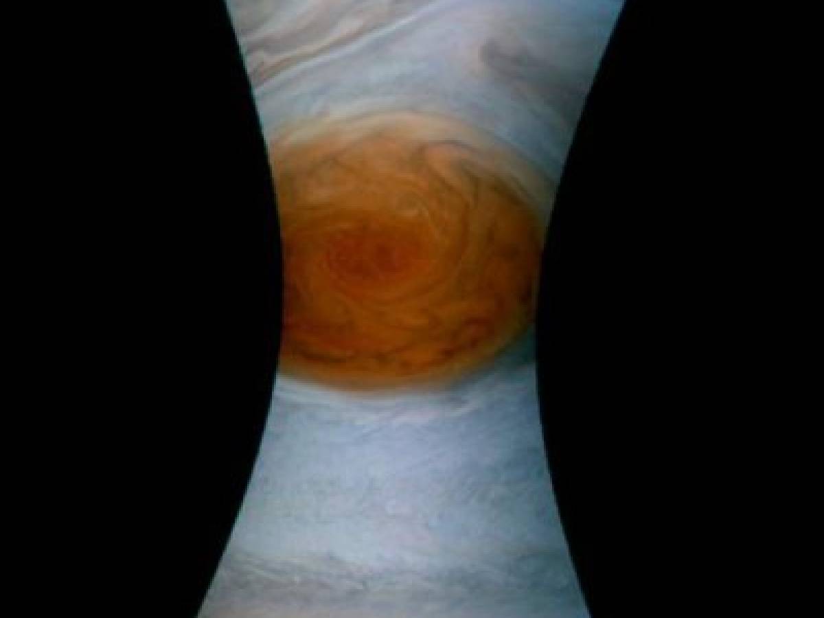 This NASA handout image obtained July 12, 2017 shows the Great Red Spot on Jupiter taken by the Juno Spacecraft on its flyby over the storm on July 11.NASA's Juno successfully peered into the giant storm raging on Jupiter. 'My latest Jupiter flyby is complete!' said a post on the @NASAJuno Twitter account. 'All science instruments and JunoCam were operating to collect data.' The unmanned spacecraft came closer than any before it to the iconic feature on the solar system's largest planet. / AFP PHOTO / NASA / Handout / RESTRICTED TO EDITORIAL USE - MANDATORY CREDIT 'AFP PHOTO /NASA/SWRI/MSSS' - NO MARKETING NO ADVERTISING CAMPAIGNS - DISTRIBUTED AS A SERVICE TO CLIENTS