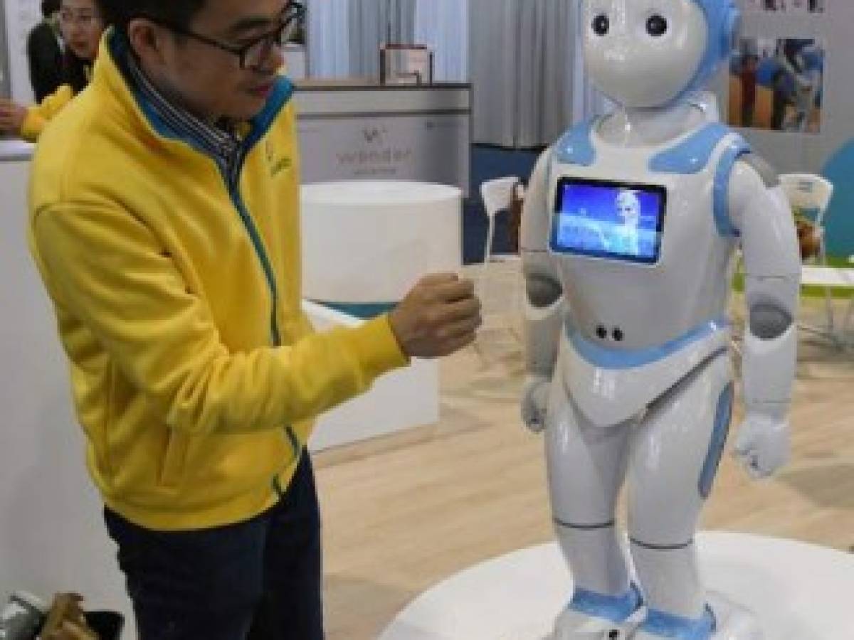 LAS VEGAS, NV - JANUARY 05: An AvatarMind iPal social companion robot for children, elder care and hospitality is displayed at CES 2017 at the Sands Expo and Convention Center on January 5, 2017 in Las Vegas, Nevada. The dancing, story-telling robot can play games and music and has 25 motors enabling it to make human-like movements and parents can remotely control it with a phone to monitor their children or video chat with them from anywhere. Young children can also ask the robot to contact their parents. CES, the world's largest annual consumer technology trade show, runs through January 8 and features 3,800 exhibitors showing off their latest products and services to more than 165,000 attendees. Ethan Miller/Getty Images/AFP