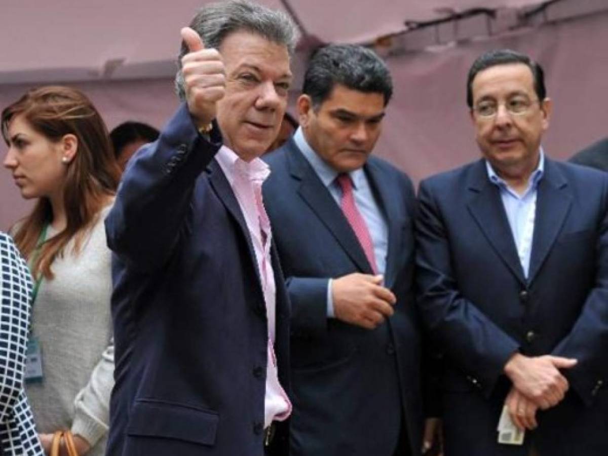 Colombia reelige a Santos y da luz verde al proceso de paz