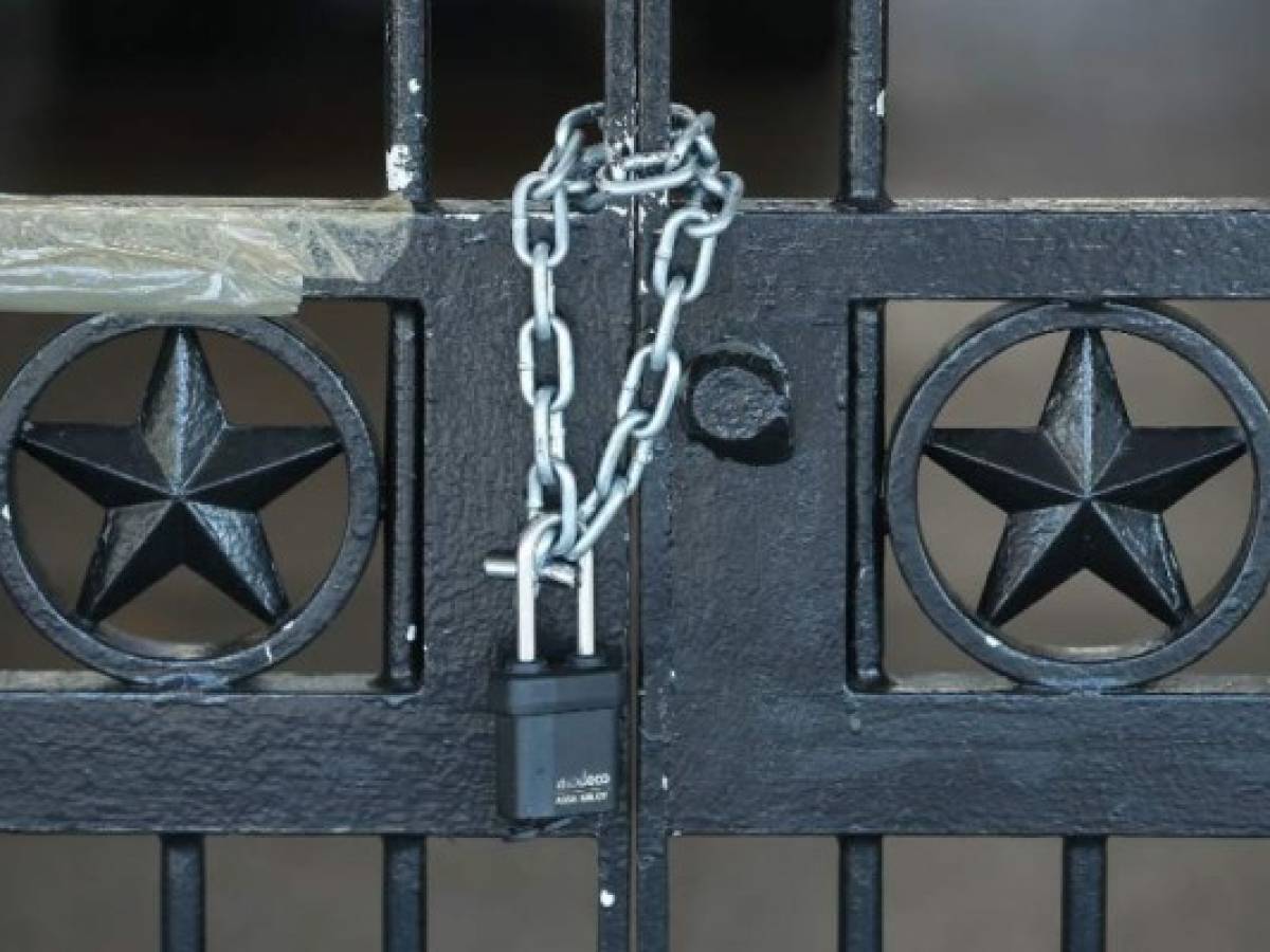 WASHINGTON, DC - DECEMBER 23: A gate leading to public restrooms is locked at the Ellipse visitor center near the National Christmas Tree that is currently closed to the public due to a partial shutdown of the federal government, on December 23, 2018 in Washington, DC. The partial shutdown will continue for at least a few more days as lawmakers head home for the holidays and Democrats and Republicans cannot agree on the amount of funding for border security. Mark Wilson/Getty Images/AFP