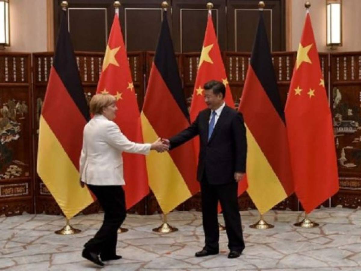 Merkel y el presidente chino, Xi Jinping. (Foto: AFP). Merkel y el presidente chino, Xi Jinping. (Foto: AFP).