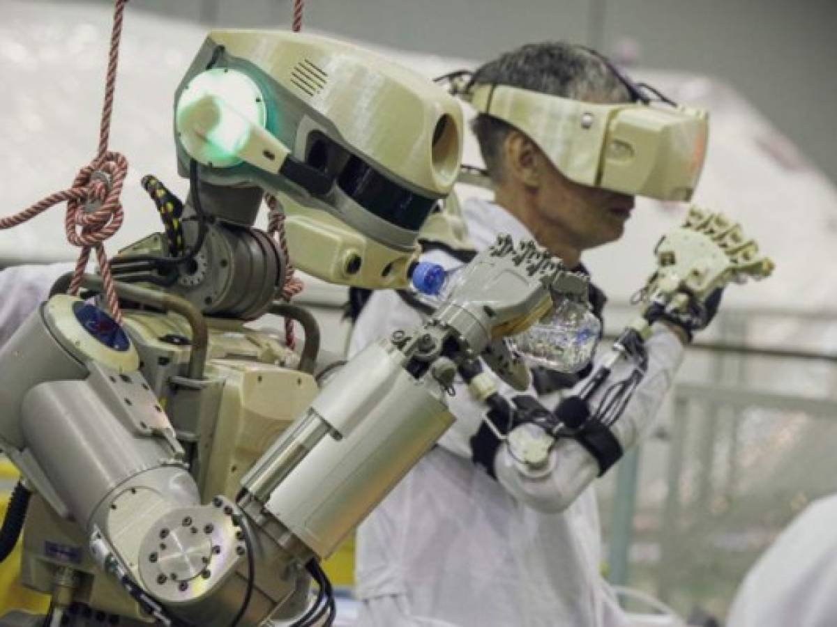 This handout picture taken on July 26, 2019 and released by the official website of the Russian State Space Corporation ROSCOSMOS on August 21, 2019 shows Russian humanoid robot Skybot F-850 (Fedor) being tested ahead of its flight on board Soyuz MS-14 spacecraft at the Baikonur Cosmodrome in Kazakhstan. - Russia space agency Roscosmos is about to send a humanoid robot to the International Space Station. Skybot F-850 will be sent to the ISS on August 22 on board the Soyuz MS-14 spacecraft, and will spend over two weeks there before returning to Earth on September 7.It's the first time that a robot will take the commander's place in a Soyuz the Skybot will monitor and report on conditions during the otherwise uncrewed flight. (Photo by - / Roscosmos space agency / AFP) / RESTRICTED TO EDITORIAL USE - MANDATORY CREDIT 'AFP PHOTO / ROSCOSMOS / Space Center Yuzhny/TsENKI /' - NO MARKETING NO ADVERTISING CAMPAIGNS - DISTRIBUTED AS A SERVICE TO CLIENTS This handout picture taken on July 26, 2019 and released by the official website of the Russian State Space Corporation ROSCOSMOS on August 21, 2019 shows Russian humanoid robot Skybot F-850 (Fedor) being tested ahead of its flight on board Soyuz MS-14 spacecraft at the Baikonur Cosmodrome in Kazakhstan. - Russia space agency Roscosmos is about to send a humanoid robot to the International Space Station. Skybot F-850 will be sent to the ISS on August 22 on board the Soyuz MS-14 spacecraft, and will spend over two weeks there before returning to Earth on September 7.It's the first time that a robot will take the commander's place in a Soyuz the Skybot will monitor and report on conditions during the otherwise uncrewed flight. (Photo by - / Roscosmos space agency / AFP) / RESTRICTED TO EDITORIAL USE - MANDATORY CREDIT 'AFP PHOTO / ROSCOSMOS / Space Center Yuzhny/TsENKI /' - NO MARKETING NO ADVERTISING CAMPAIGNS - DISTRIBUTED AS A SERVICE TO CLIENTS