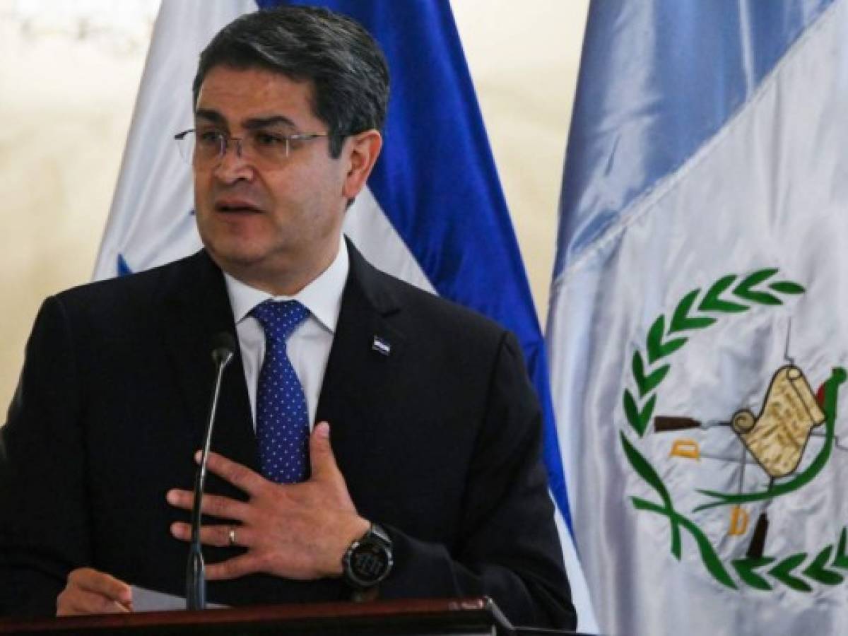 Honduras: Presidente dice acuerdo de tercer país seguro sería 'carga difícil'
