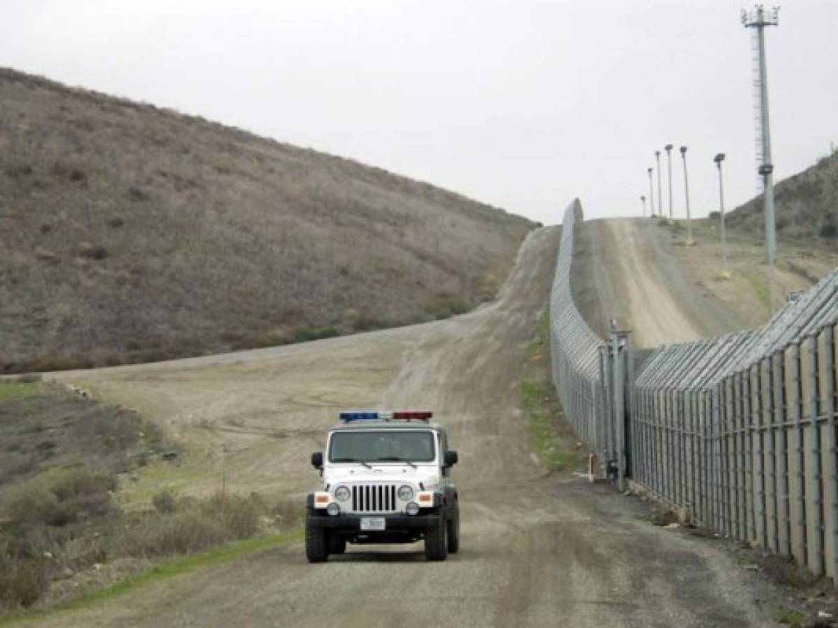 A United States Border Patrol vehicle cruises along the primary and secondary fence line on the Tijuana, Mexico border in San Diego, December 20, 2007. The area has been the site of alleged increased violence against the Border Patrol. The Border Patrol says its agents were attacked nearly 1,000 times during a one-year period along the Mexican border, typically by assailants hurling rocks, bottles and bricks. Now the agency is responding with tear gas and powerful pepper-spray weapons firing into Mexico. (UPI Photo/Earl Cryer)