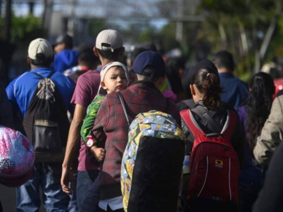 A group of Salvadoran migrants start their journey towards the United States in San Salvador, on January 20, 2020. (Photo by Marvin RECINOS / AFP) A group of Salvadoran migrants start their journey towards the United States in San Salvador, on January 20, 2020. (Photo by Marvin RECINOS / AFP)