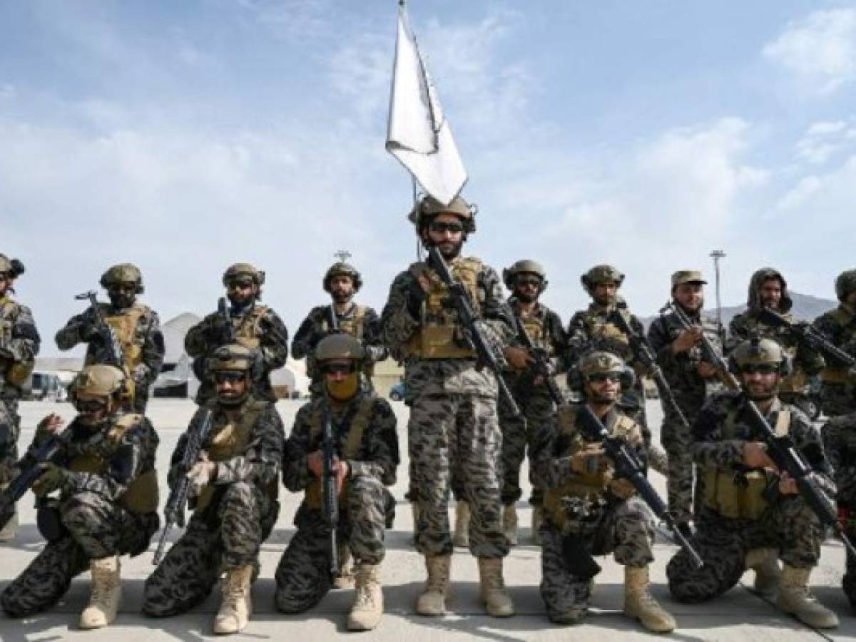 Members of the Taliban Badri 313 military unit take a position at the airport in Kabul on August 31, 2021, after the US has pulled all its troops out of the country to end a brutal 20-year war -- one that started and ended with the hardline Islamist in power. (Photo by WAKIL KOHSAR / AFP)