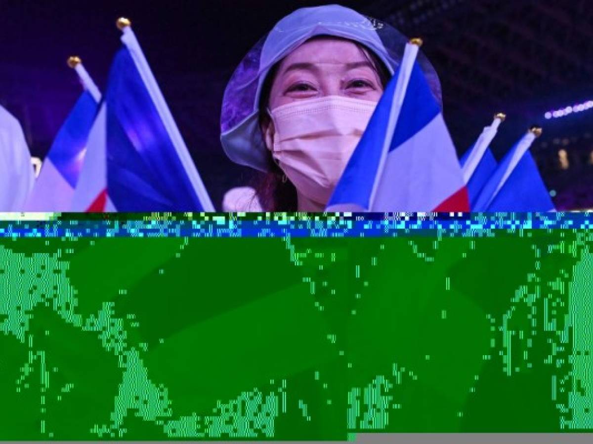 Un artista agita la bandera francesa durante la ceremonia de clausura de los Juegos Olímpicos de Tokio 2020, en el Estadio Olímpico, en Tokio, el 8 de agosto de 2021. (Foto de Adek BERRY / AFP) Un artista agita la bandera francesa durante la ceremonia de clausura de los Juegos Olímpicos de Tokio 2020, en el Estadio Olímpico, en Tokio, el 8 de agosto de 2021. (Foto de Adek BERRY / AFP)