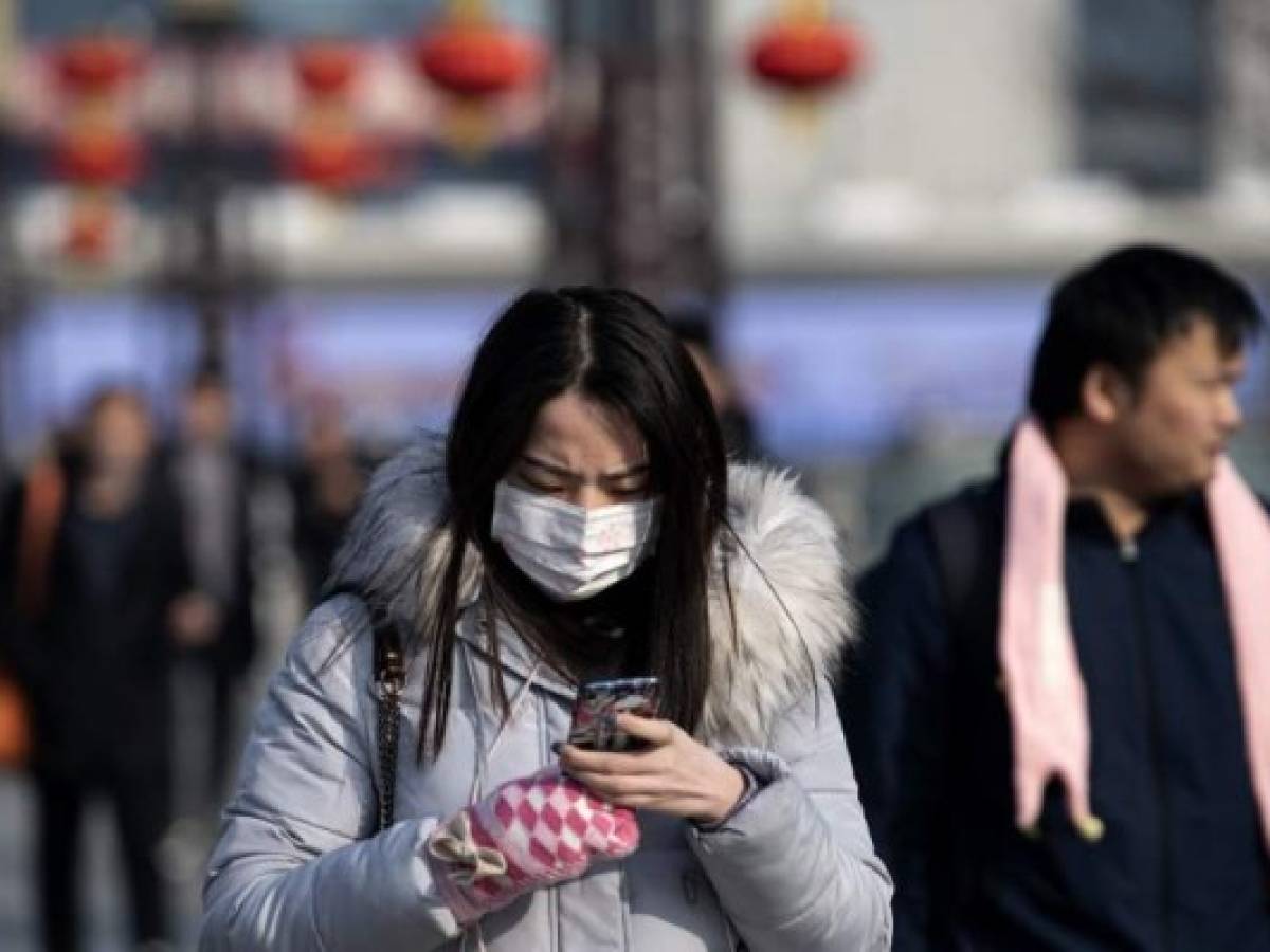 Passengers arrive at the train station in Hanzhong, a mountainous region of Shaanxi province on January 20, 2020, ahead of the Lunar New Year. - A mysterious SARS-like virus has killed a third person and spread around China -- including to Beijing -- authorities said on January 20, fuelling fears of a major outbreak as millions begin travelling for the Lunar New Year in humanity's biggest migration. (Photo by NOEL CELIS / AFP) Passengers arrive at the train station in Hanzhong, a mountainous region of Shaanxi province on January 20, 2020, ahead of the Lunar New Year. - A mysterious SARS-like virus has killed a third person and spread around China -- including to Beijing -- authorities said on January 20, fuelling fears of a major outbreak as millions begin travelling for the Lunar New Year in humanity's biggest migration. (Photo by NOEL CELIS / AFP)