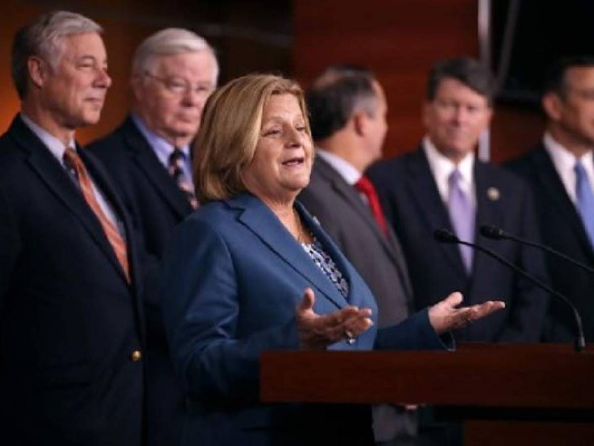 WASHINGTON, DC - NOVEMBER 09: Rep. Ileana Ros-Lehtinen (R-FL) is joined by more than a dozen Republican members of Congress as she speaks during a news conference about the Deferred Action for Childhood Arrivals (DACA) program at the U.S. Capitol November 9, 2017 in Washington, DC. Conservative and moderate House GOP members voiced their support for legislation that would create a permanent solution for DACA 'Dreamers.' Chip Somodevilla/Getty Images/AFP