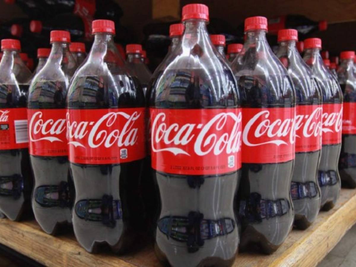 Coca-Cola redujo sus ganancias
