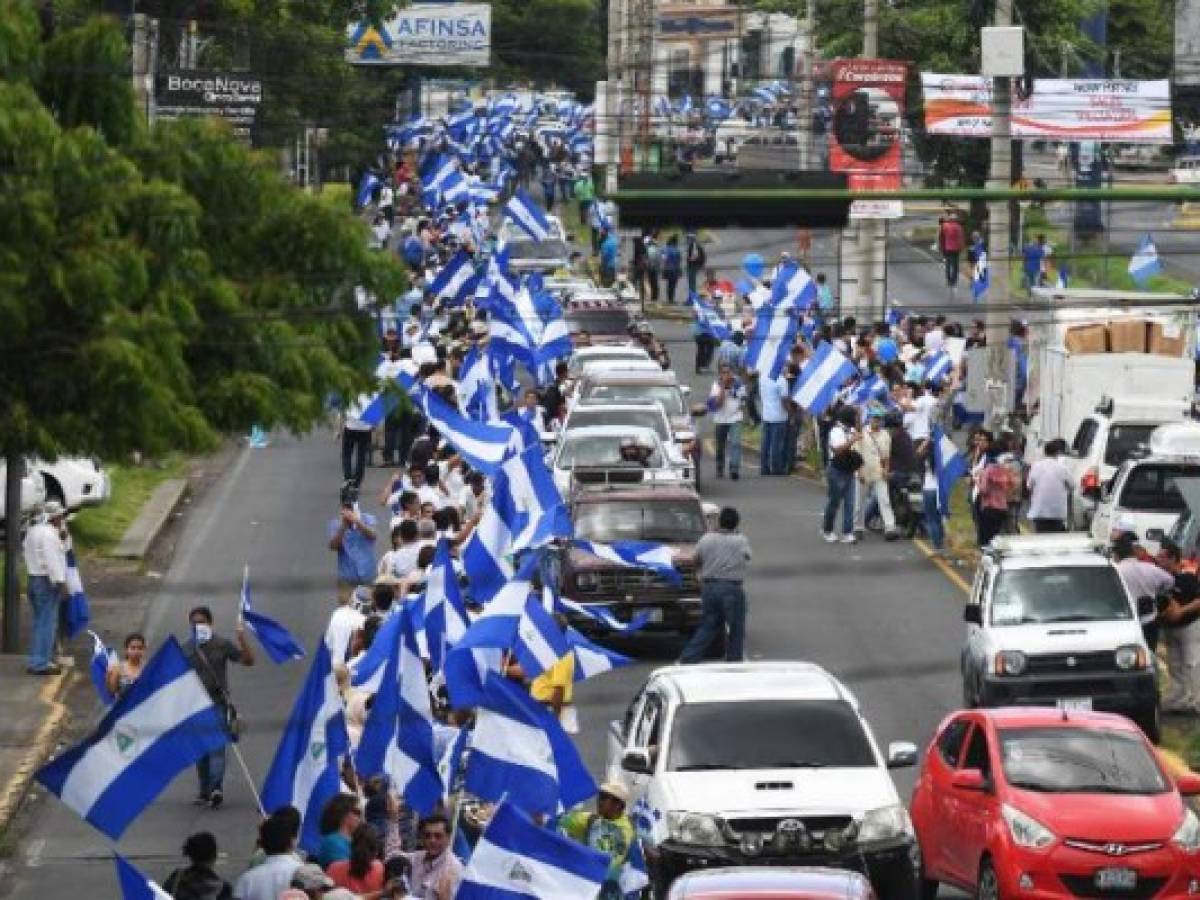 Protestas antigobierno forman una Cadena Humana en Managua, el 4 de julio de 2014. AFP PHOTO / MARVIN RECINOS