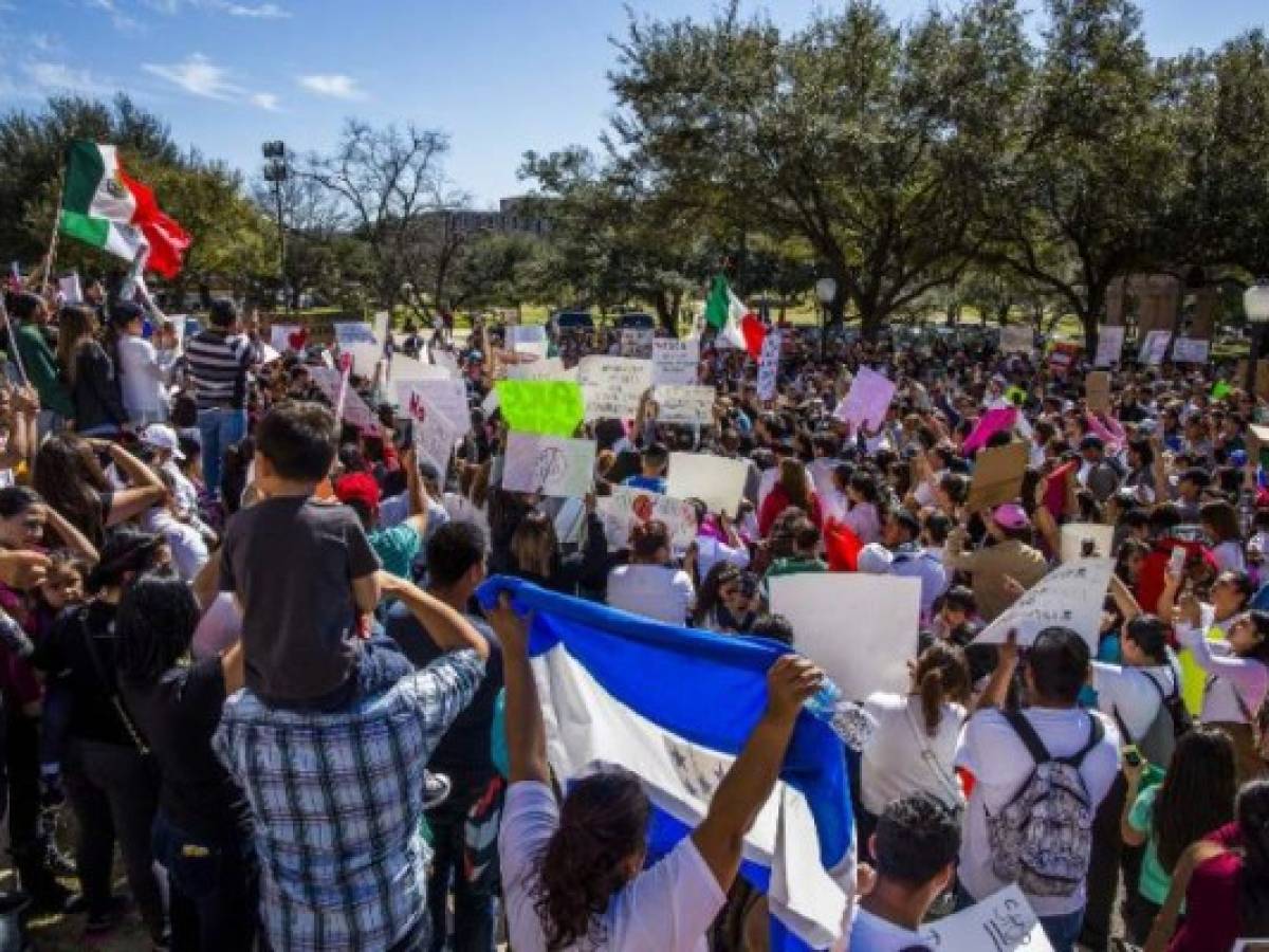 AUSTIN, TX - FEBRUARY 16: Protesters march in the streets outside the Texas State Capital on 'A Day Without Immigrants' February 16, 2017 in Austin, Texas. The crowd, which grew to well over a thousand participants, marched from the Austin City Hall to the Texas State Capital. Across the country hundreds of restaurants and eateries are closing for the day to protest President Trump's immigration policies and to highlight the contributions of immigrants to U.S. business and life. Drew Anthony Smith/Getty Images/AFP