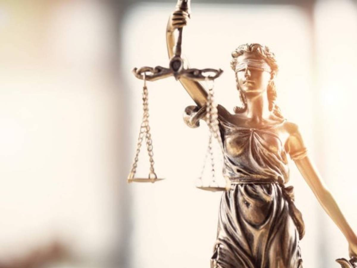 Justice blindfolded lady holding scales and sword statue Justice blindfolded lady holding scales and sword statue