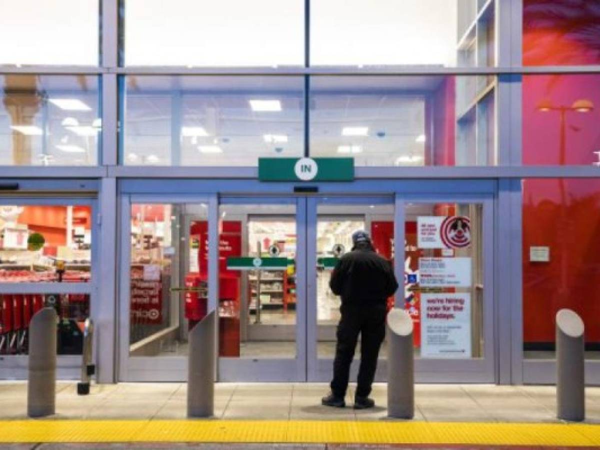 EMERYVILLE, CA - NOVEMBER 29: A lone Black Friday shopper waits for the opening of a Target store on November 29, 2019 in Emeryville, United States. Black Friday is traditionally the biggest shopping event of the year, and marks the beginning of the holiday shopping season. Philip Pacheco/Getty Images/AFP