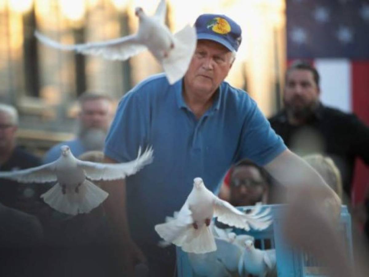 DAYTON, OHIO - AUGUST 04: Doves are released during a memorial service in the Oregon District to recognize the victims of an early-morning mass shooting in the popular nightspot on August 04, 2019 in Dayton, Ohio. At least 9 people were reported to have been killed and another 27 injured when a gunman identified as 24-year-old Connor Betts opened fire with a AR-15 style rifle. The shooting comes less than 24 hours after a gunman in Texas opened fire at a shopping mall killing at least 20 people. Scott Olson/Getty Images/AFP