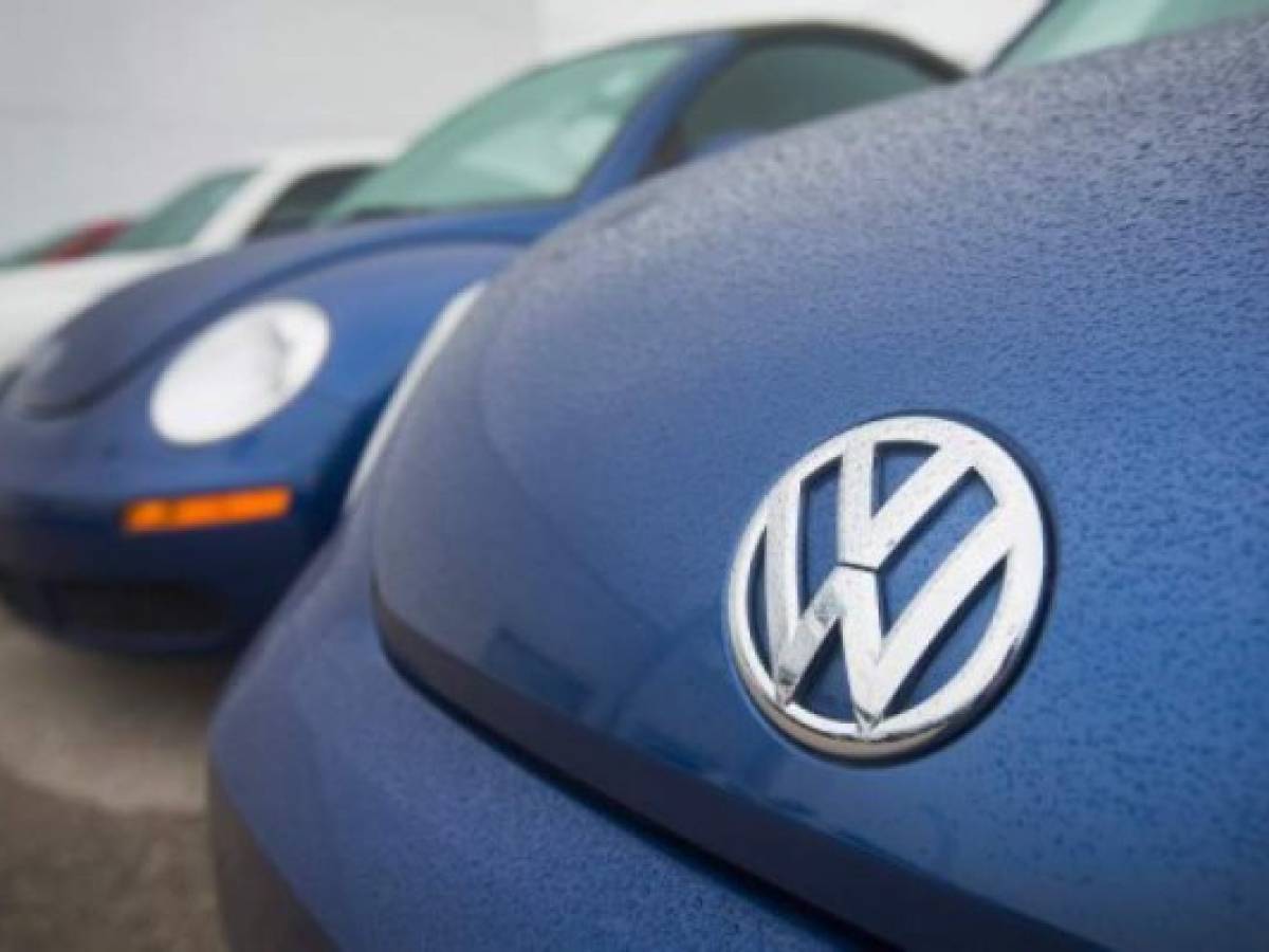 (FILES) In this file photo taken on September 18, 2015 Volkswagen Beetles are offered for sale at a dealership in Chicago, Illinois. Volkswagen announced on September 13, 2018 that it would end production of its iconic 'Beetle' cars in 2019 following a pair of final editions of the insect-inspired vehicles.The move comes as Volkswagen emphasizes electric autos and larger family-oriented vehicles, said Hinrich Woebcken, chief executive of Volkswagen Group of America. But Woebcken opened the door to reviving the model at some point, saying 'never say never.' / AFP PHOTO / GETTY IMAGES NORTH AMERICA / SCOTT OLSON