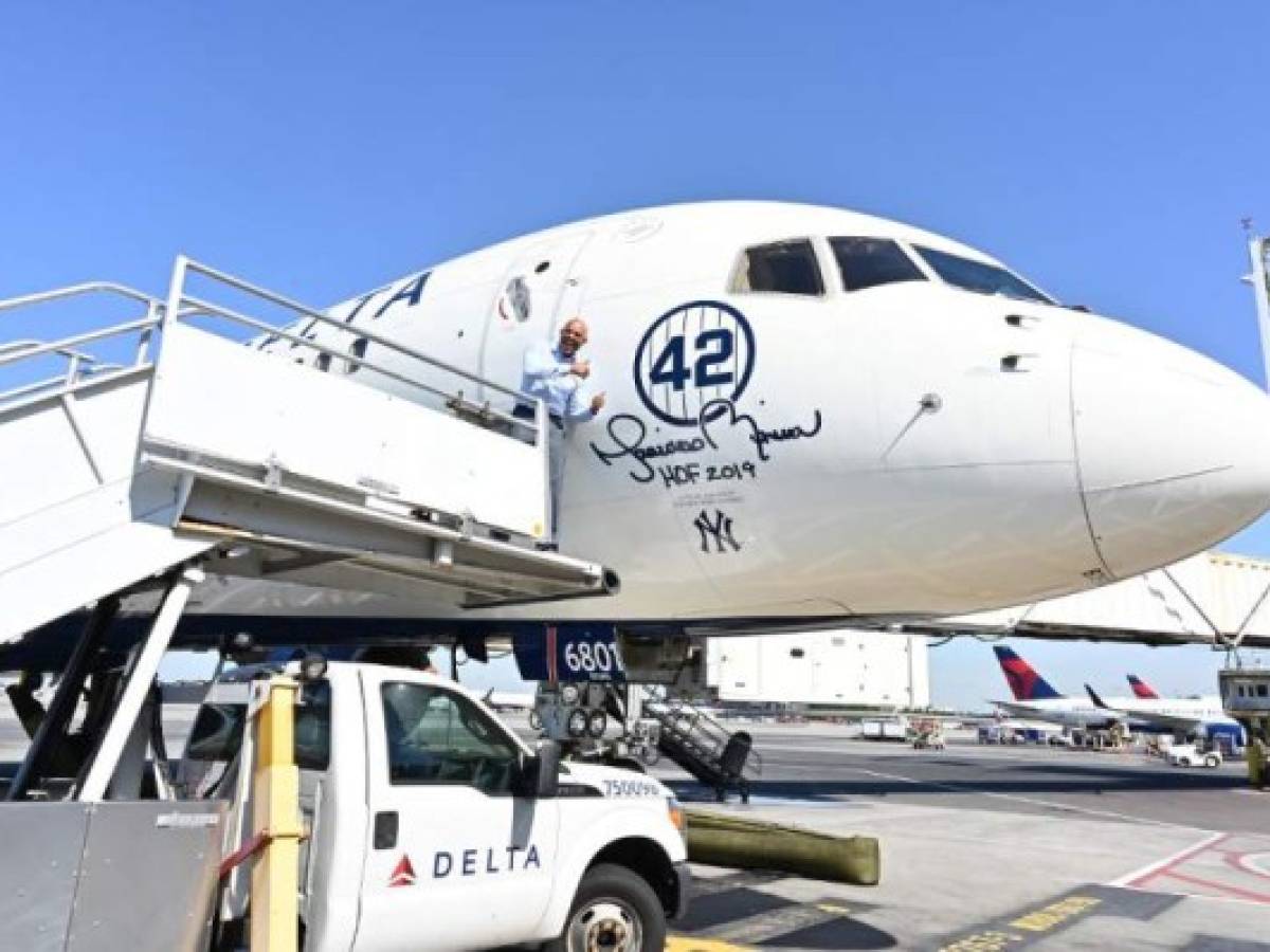 NEW YORK, NEW YORK - JULY 16: Ahead of his Hall of Fame induction, former New York Yankees pitcher and unanimous Hall of Fame selection Mariano Rivera attends as Delta Air Lines dedicates Terminal 4's Gate 42 and a 757 aircraft to him on July 16, 2019, at JFK Airport in New York City. Astrid Stawiarz/Getty Images for Delta Air Lines/AFP