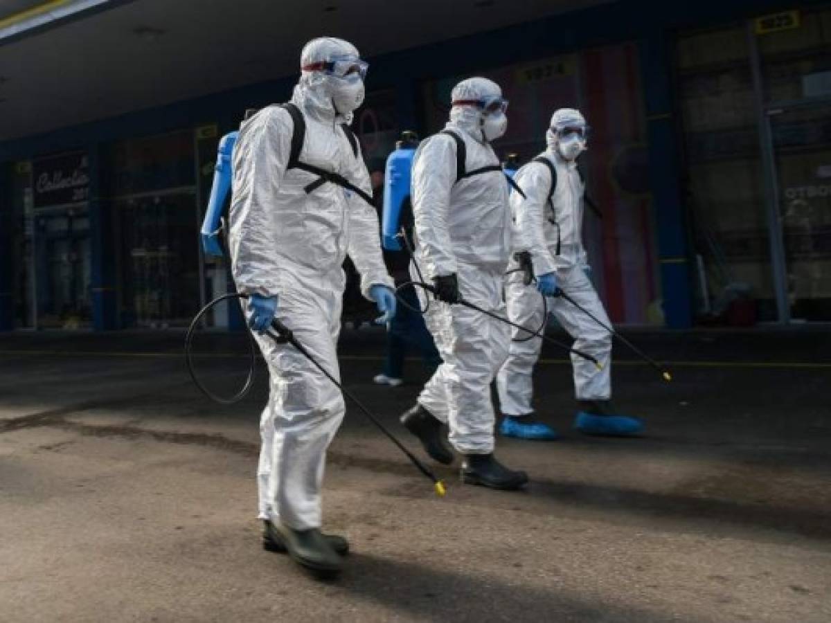 Members of Sofia's Municipality disinfects the biggest market for Chinese goods in Sofia to prevent the spread of the COVID-19, the novel coronavirus, on March 12, 2020. (Photo by NIKOLAY DOYCHINOV / AFP) Members of Sofia's Municipality disinfects the biggest market for Chinese goods in Sofia to prevent the spread of the COVID-19, the novel coronavirus, on March 12, 2020. (Photo by NIKOLAY DOYCHINOV / AFP)