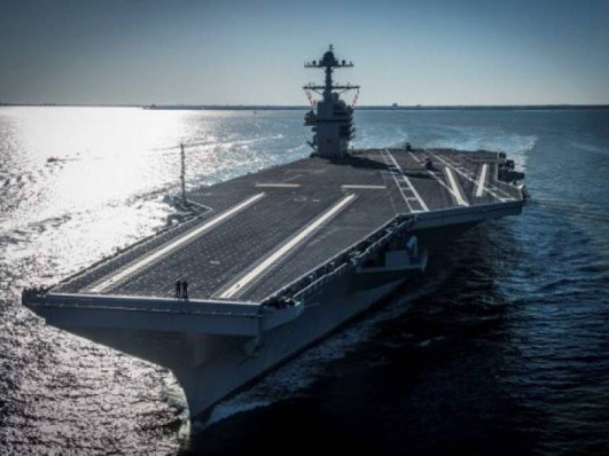 The future USS Gerald R. Ford (CVN 78) is seen underway on its own power for the first time, April 8, 2017 in Newport News, Virginia. The first-of-class ship -- the first new US aircraft carrier design in 40 years -- will spend several days conducting builder's sea trials, a comprehensive test of many of the ship's key systems and technologies. / AFP PHOTO / US Navy / MC2 Ridge Leoni