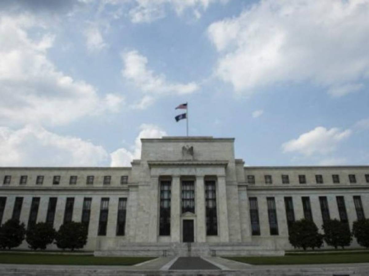 The Federal Reserve is seen in Washington, DC on June 14, 2017.The US Federal Reserve raised its benchmark interest rate by a quarter point to 1.0-1.25% on Wednesday and signaled another increase remains likely this year, despite the recent spate of weak economic data. / AFP PHOTO / ANDREW CABALLERO-REYNOLDS