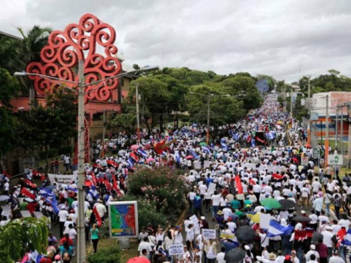 Los simpatizantes de Daniel Ortega también salieron a la calle en la marcha 'Víctimas del terorismo' demandando prisión y castigo para los opositores. Los simpatizantes de Daniel Ortega también salieron a la calle en la marcha 'Víctimas del terorismo' demandando prisión y castigo para los opositores.