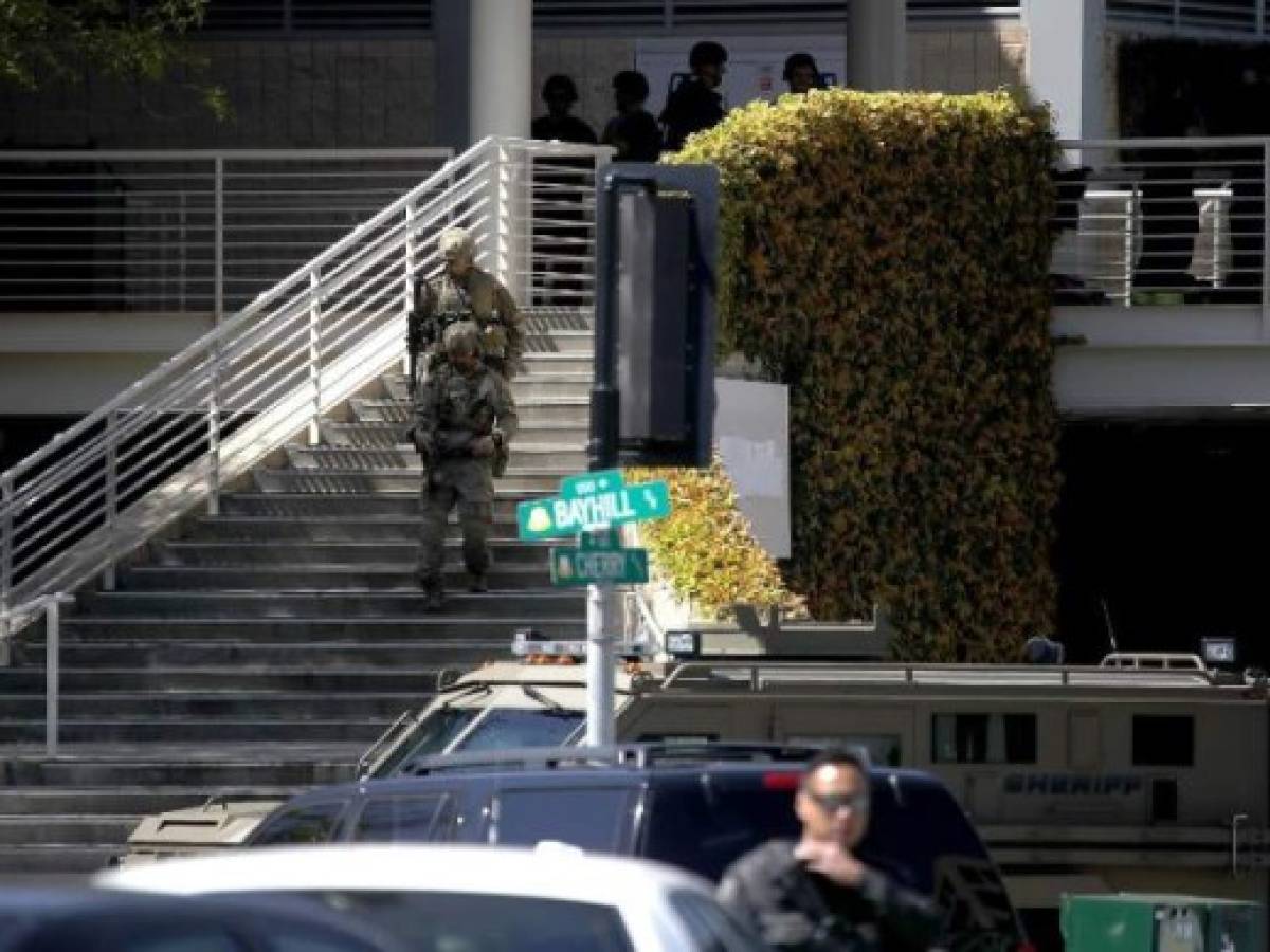 SAN BRUNO, CA - APRIL 03: Police in tactical gear walk outside of the YouTube headquarters on April 3, 2018 in San Bruno, California. A woman opened fire at the facility, wounding four people before taking her own life, according to authorities. Justin Sullivan/Getty Images/AFP SAN BRUNO, CA - APRIL 03: Police in tactical gear walk outside of the YouTube headquarters on April 3, 2018 in San Bruno, California. A woman opened fire at the facility, wounding four people before taking her own life, according to authorities. Justin Sullivan/Getty Images/AFP