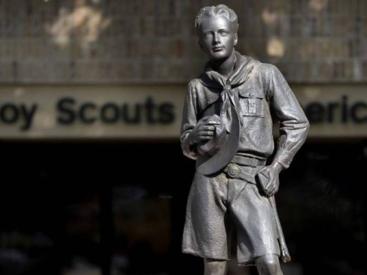 (FILES) In this file photo taken on February 03, 2013 a general view of a statue outside the Boy Scouts of America Headquarters on February 4, 2013 in Irving, Texas. - The Boy Scouts of America has filed for bankruptcy early February 18, 2020, a sign of the century-old organization's financial instability as it faces some 300 lawsuits from men who say they were sexually abused as scouts. The Scouts Chapter 11 petition, filed in Bankruptcy Court in Delaware, comes amid declining membership and a wave of new sex-abuse lawsuits after several states, including California, New York and New Jersey, recently expanded legal options for childhood victims to sue. (Photo by TOM PENNINGTON / GETTY IMAGES NORTH AMERICA / AFP)