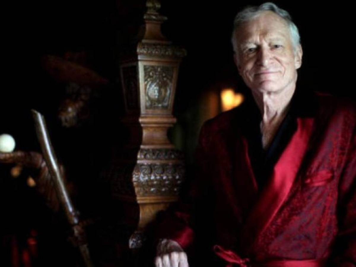 (FILES) This file photo taken on January 16, 2014 shows Hugh Hefner posing at Playboy's 60th Anniversary special event in Los Angeles, California. Hugh Hefner, the founder of Playboy who helped escort nudity into the American mainstream, died on September 28, 2017 aged 91 at his Los Angeles home. / AFP PHOTO / GETTY IMAGES NORTH AMERICA / Charley Gallay (FILES) This file photo taken on January 16, 2014 shows Hugh Hefner posing at Playboy's 60th Anniversary special event in Los Angeles, California. Hugh Hefner, the founder of Playboy who helped escort nudity into the American mainstream, died on September 28, 2017 aged 91 at his Los Angeles home. / AFP PHOTO / GETTY IMAGES NORTH AMERICA / Charley Gallay