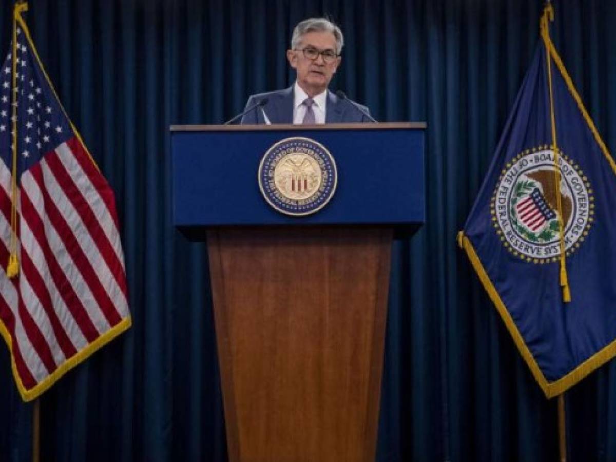 US Federal Reserve Chairman Jerome Powell gives a press briefing after the surprise announcement the FED will cut interest rates on March 3, 2020 in Washington,DC. - The US Federal Reserve announced an emergency rate cut Tuesday, responding to the growing economic risk posed by the coronavirus epidemic and giving President Donald Trump the stimulus he has called for. In a unanimous decision, the Fed's policy-setting committee slashed its key interest rate by a half point to a range of 1.0-1.25. (Photo by Eric BARADAT / AFP)