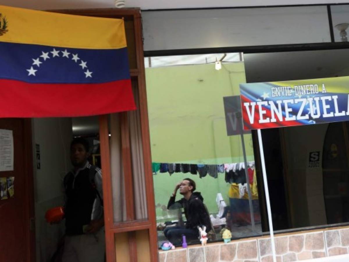 Moody's baja calificación de Venezuela y espera fuertes pérdidas para inversores en bonos