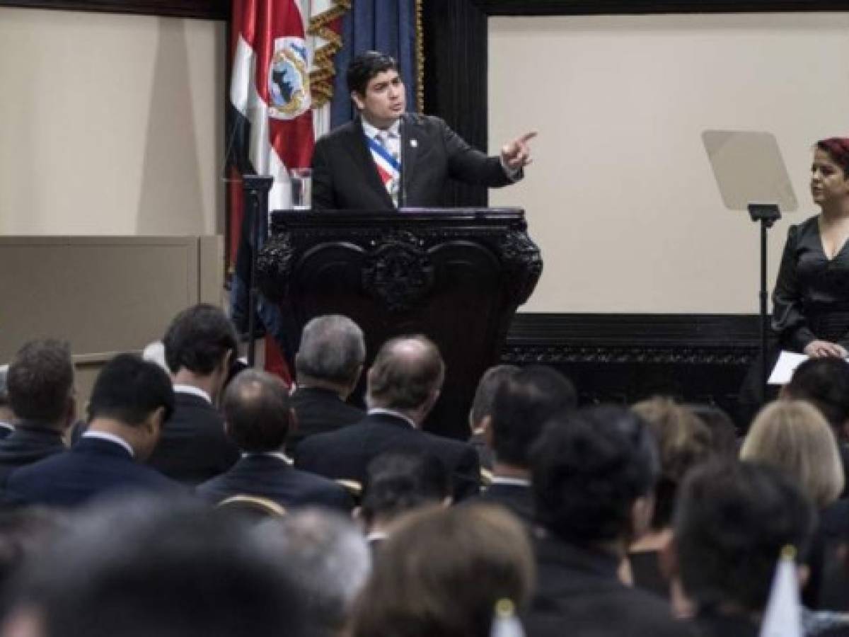 Costa Rican President Carlos Alvarado gives his speech before the the Legislative Assembly after his first year in office, in San Jose, on May 2, 2019. (Photo by Ezequiel BECERRA / AFP)