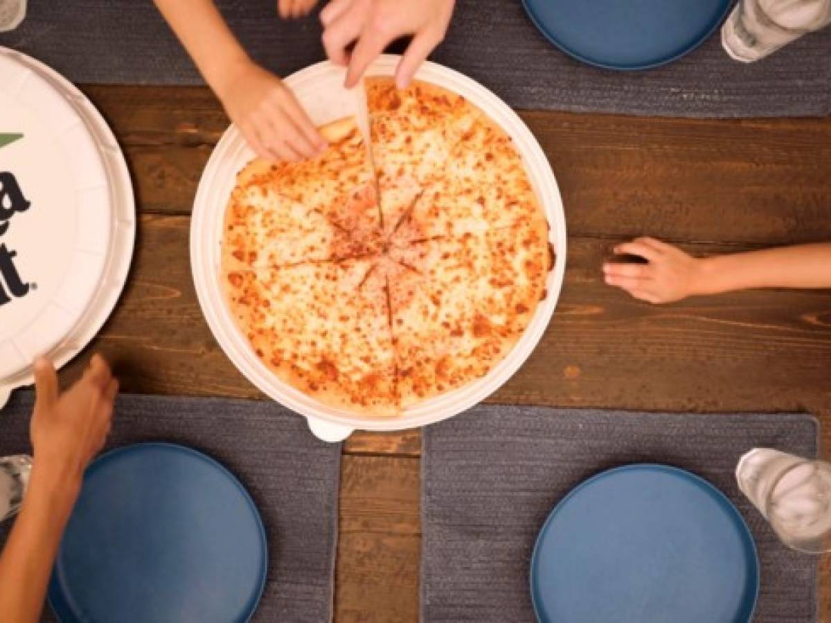 Pizza Hut prueba usar cajas redondas para sus pizzas