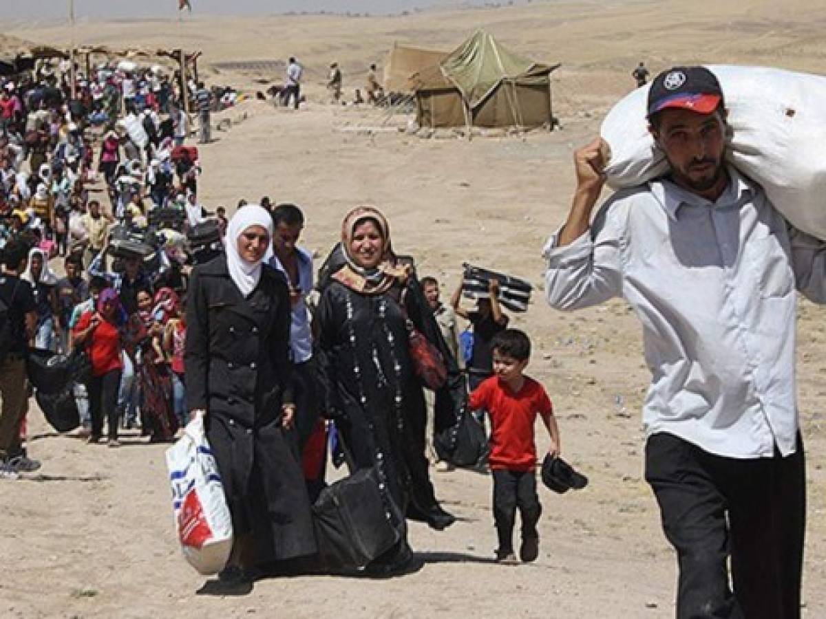 EE.UU: 21 estados se niegan a recibir a refugiados sirios