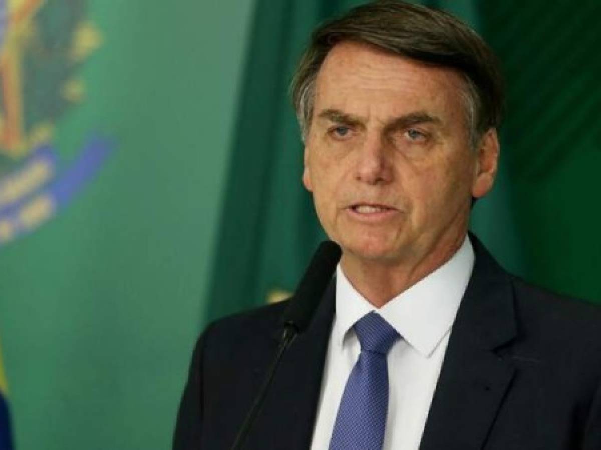 BRASILIA, Jan. 26, 2019 (Xinhua) -- Brazil's President Jair Bolsonaro attends a press conference on the collapse of a dam, at Planalto Palace, in Brasilia, capital of Brazil, on Jan. 25, 2019. At least seven people were killed, nine injured and at least 150 others are missing after a tailings dam collapsed Friday afternoon in southeastern state of Minas Gerais, the state government said Friday evening. (Xinhua/Ernesto Rodrigues/AGENCIA ESTADO/IANS)
