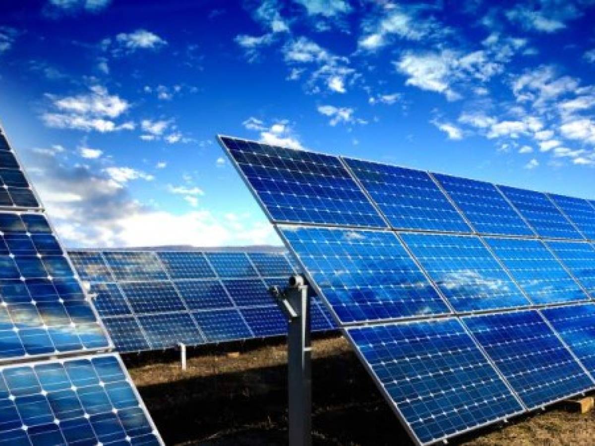 Photo voltaic solar panels and blue sky with clouds Photo voltaic solar panels and blue sky with clouds