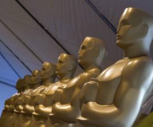 (FILES) In this file photo taken on February 24, 2016 Oscar statuettes are seen as workers make preparations for the 88th Annual Academy Awards at Hollywood & Highland Center, Hollywood, California. - The Oscars will again go without a host next month, repeating a format credited with boosting ratings last year, US network ABC confirmed on January 8, 2020. 'Together with the Academy, we have decided there will be no traditional host, repeating for us what worked last year,' ABC entertainment president Karey Burke told a television summit near Los Angeles, according to showbiz website Deadline Hollywood. (Photo by VALERIE MACON / AFP)