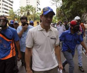 El dirigente opositor, Henrique Capriles, en la manifestación del 1 de mayo en Caracas. (Foto: AFP).