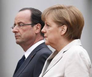 Hollande y Merkel, horas decisivas para evitar un drama incontenible en Europa. (Foto: Archivo)