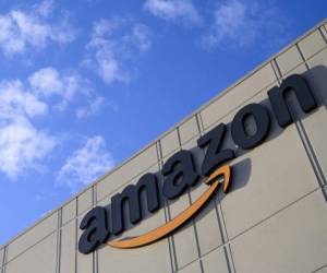 (FILES) In this file photo taken on February 5, 2019, the Amazon fulfillment center in Staten Island, one of the five boroughs of New York City. - Amazon said on August 28, 2019, more than 400 US police departments had joined its 'Ring Neighbors' network, a program aimed at curbing crime using video from the company's smart doorbell that has raised civil liberties concerns. The program represents an unusual partnership between the US technology giant and law enforcement agencies, which have offered discounted or free Ring devices to residents as part of crime prevention efforts. (Photo by Johannes EISELE / AFP)