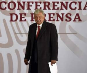 Mexican President Andres Manuel Lopez Obrador arrives for a press conference at the National Palace in Mexico City on January 14, 2019. - Lopez Obrador spoke about the new measures taken by the government to combat fuel theft. In the past days gasoline shortages have spread across the country, caused by a crackdown on such theft. (Photo by Alfredo ESTRELLA / AFP)