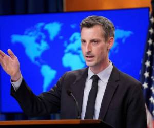 FILE PHOTO: U.S. State Department Spokesman Ned Price speaks to reporters during a news briefing at the State Department in Washington, U.S., February 17, 2021. REUTERS/Kevin Lamarque/Pool/File Photo