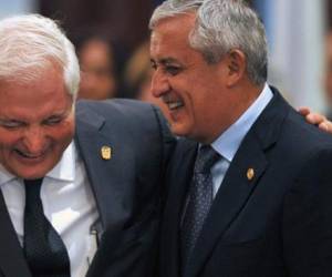 Presidentes Ricardo Martinelli y Otto Pérez Molina. (Foto: AFP)