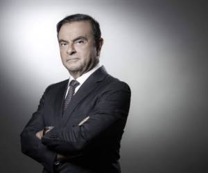(FILES) In this file photo taken on September 12, 2018 French Renault group CEO and chairman of Japan's Nissan Motor CO. Ltd and Mitsubishi Motors Corp, Carlos Ghosn poses during a photo session at the Renault headquarters in Boulogne-Billancourt. - Nissan chairman Carlos Ghosn was reportedly under arrest in Tokyo on November 19, 2018, as his firm accused him of 'significant acts of misconduct' and said it would seek to oust him. (Photo by JOEL SAGET / AFP)