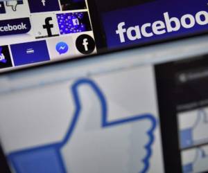 (FILES) This file photo taken on November 20, 2017 shows logos of US online social media and social networking service Facebook.Facebook said on March 20, 2018 it is 'outraged' by misuse of data by Cambridge Analytica, the British firm at the centre of a major data scandal rocking Facebook, who suspended its chief executive as lawmakers demanded answers from the social media giant over the breach. / AFP PHOTO / LOIC VENANCE