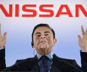 (FILES) In this file photo taken on May 11, 2012, President and CEO of Japan's auto giant Nissan Carlos Ghosn gestures as he answers questions during a press conference at the headquarters in Yokohama, suburban Tokyo. - Nissan board members have sacked Carlos Ghosn as chairman, local media reported on November 22, 2018, which would be a spectacular fall from grace for the once-revered boss whose arrest for financial misconduct stunned the car industry and the business world. (Photo by Toru YAMANAKA / AFP)