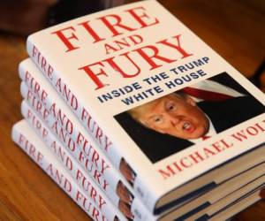CORTE MADERA, CA - JANUARY 05: Copies of the book 'Fire and Fury' by author Michael Wolff are displayed on a shelf at Book Passage on January 5, 2018 in Corte Madera, California. A controversial new book about the inner workings of the Trump administration hit bookstore shelves nearly a week earlier than anticipated after lawyers for Donald Trump issued a cease and desist letter to publisher Henry Holt & Co. Justin Sullivan/Getty Images/AFP