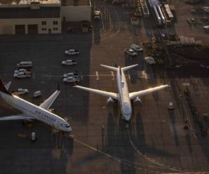 MOSES LAKE, WA - OCTOBER 23: Boeing 737 MAX airplanes are parked at Grant County International Airport October 23, 2019 in Moses Lake, Washington. Boeing reported that its profits were down by more than half in the latest quarter. The company has finished updates and testing on the 737 MAX and plans to have the planes flying by the end of the year. David Ryder/Getty Images/AFP