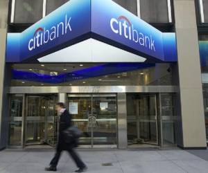 (FILES) In this file photo The Citibank Corporate Office & Headquarters is viewed in midtown Manhattan July 14, 2014. - Citigroup reported a steep decline in first-quarter profits on April 15, 2020 as it set aside around $7 billion in case of loan defaults due to coronavirus shutdown. Net profit came in at $2.5 billion for the quarter ending March 31, down 46 percent from the year-ago period. Revenues rose 12 percent to $20.7 billion. (Photo by Timothy A. CLARY / AFP)