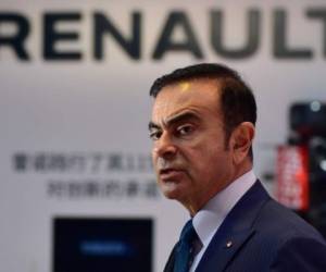 (FILES) This file photo taken on April 20, 2015 shows chairman and CEO of Nissan and Renault, Carlos Ghosn, speaking during an interview at the 16th Shanghai International Automobile Industry Exhibition in Shanghai. - Nissan chairman Carlos Ghosn was arrested in Tokyo on November 19, 2018 for financial misconduct, public broadcaster NHK and other Japanese media outlets reported. (Photo by Johannes EISELE / AFP)