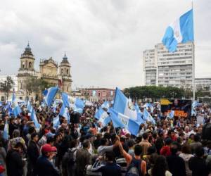 People demonstrate in support of the International Commission Against Impunity in Guatemala (CICIG,) at the Constitution square in Guatemala City, on September 1, 2018.Guatemalan President Jimmy Morales announced Friday Guatemala will not renew the mandate of a UN anti-corruption mission, which he accused of improper interference on internal matters of the country. The Commission presented evidence that Morales' FCN-Nacion party failed to report nearly one million dollars in financing to electoral authorities during his successful 2015 presidential campaign. / AFP PHOTO / Johan ORDONEZ